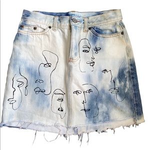 Acid wash denim skirt size 2 with hand painted face print